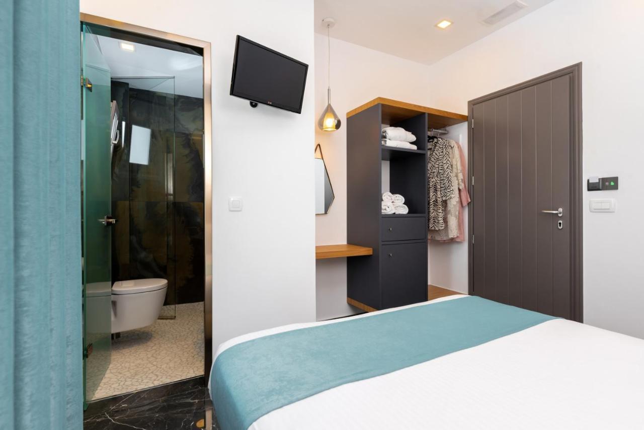 Deluxe Hotel Santorini Тира Экстерьер фото