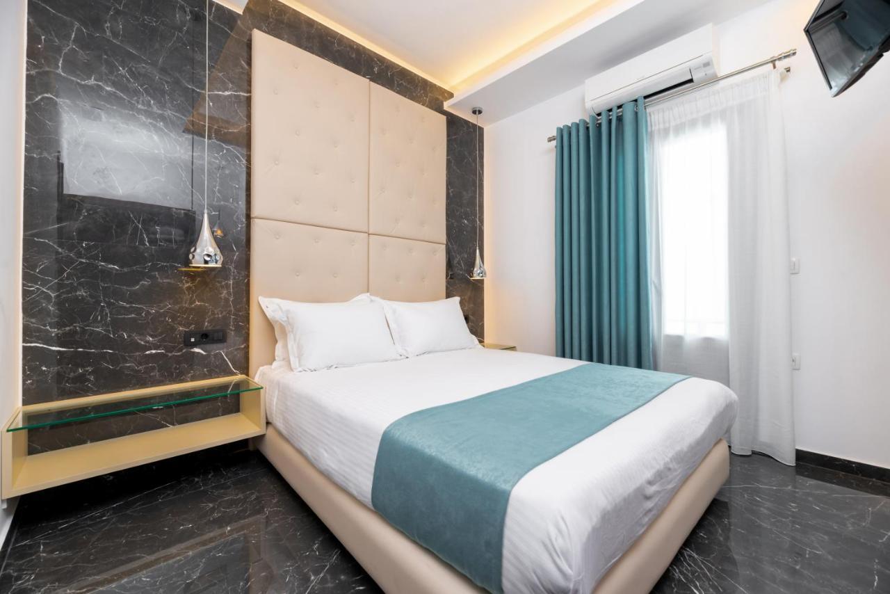 Deluxe Hotel Santorini Тира Экстерьер фото