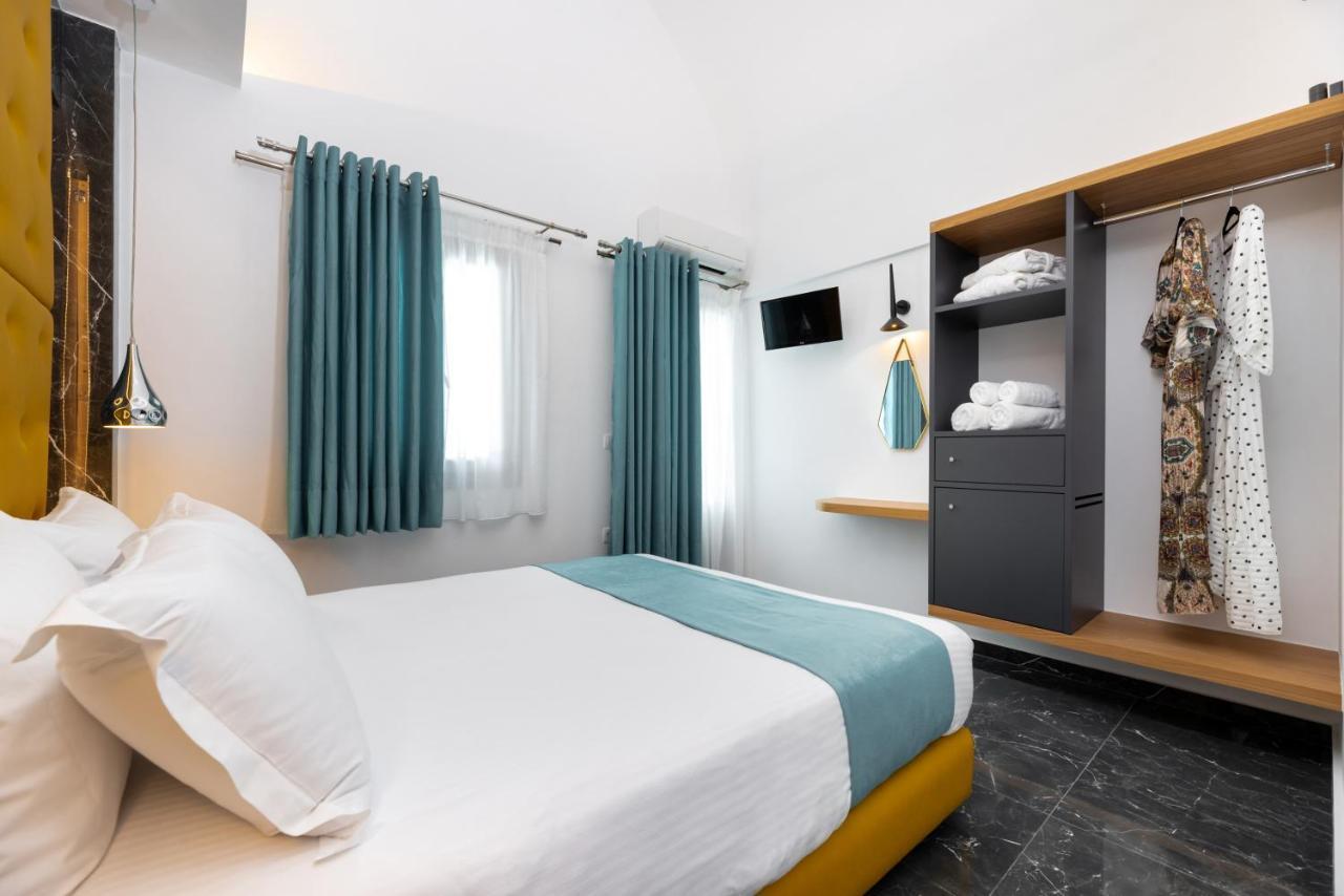 Deluxe Hotel Santorini Тира Экстерьер фото