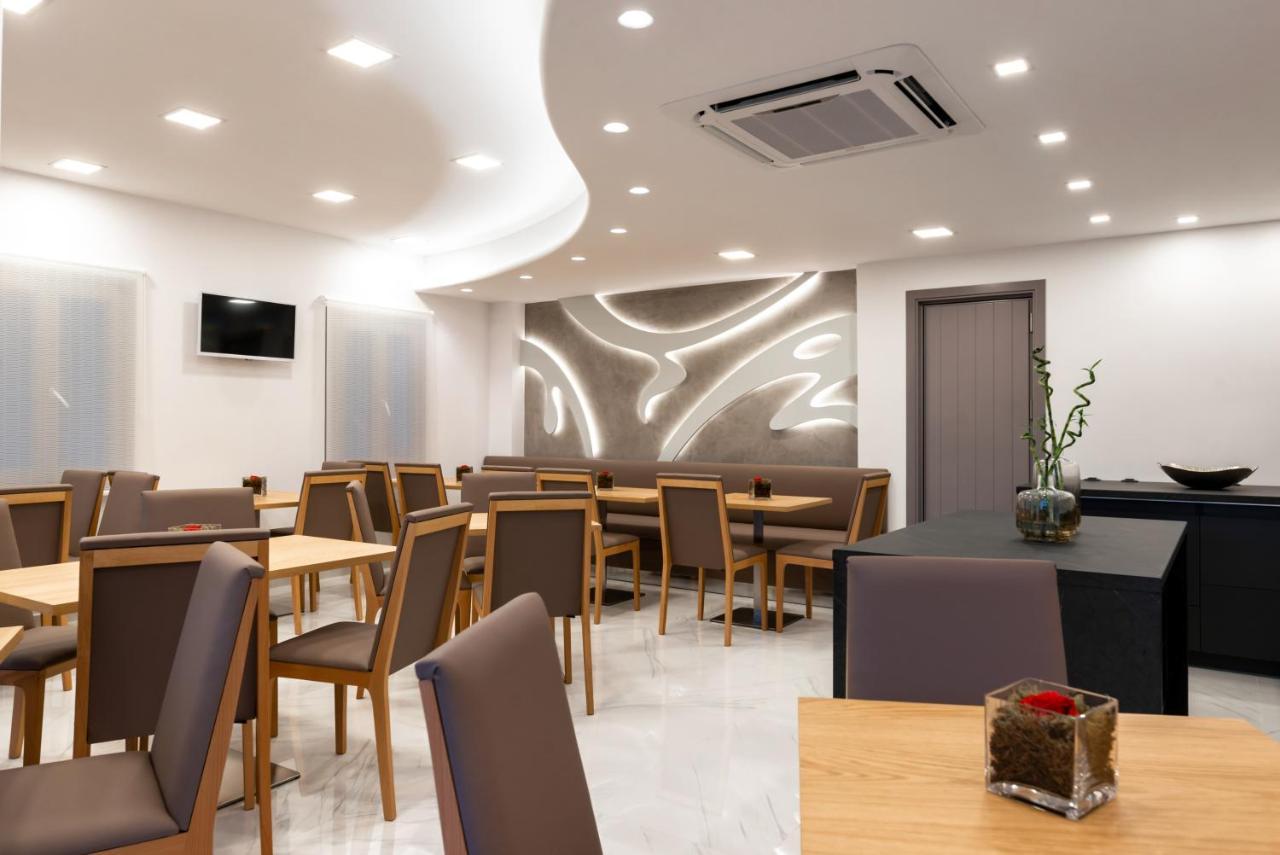 Deluxe Hotel Santorini Тира Экстерьер фото
