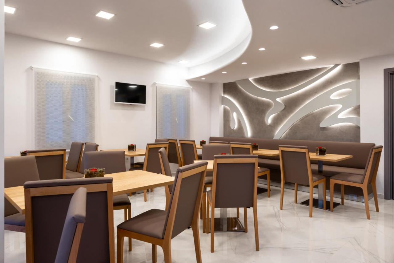 Deluxe Hotel Santorini Тира Экстерьер фото